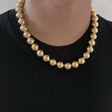 Ira Gold Ball Necklace